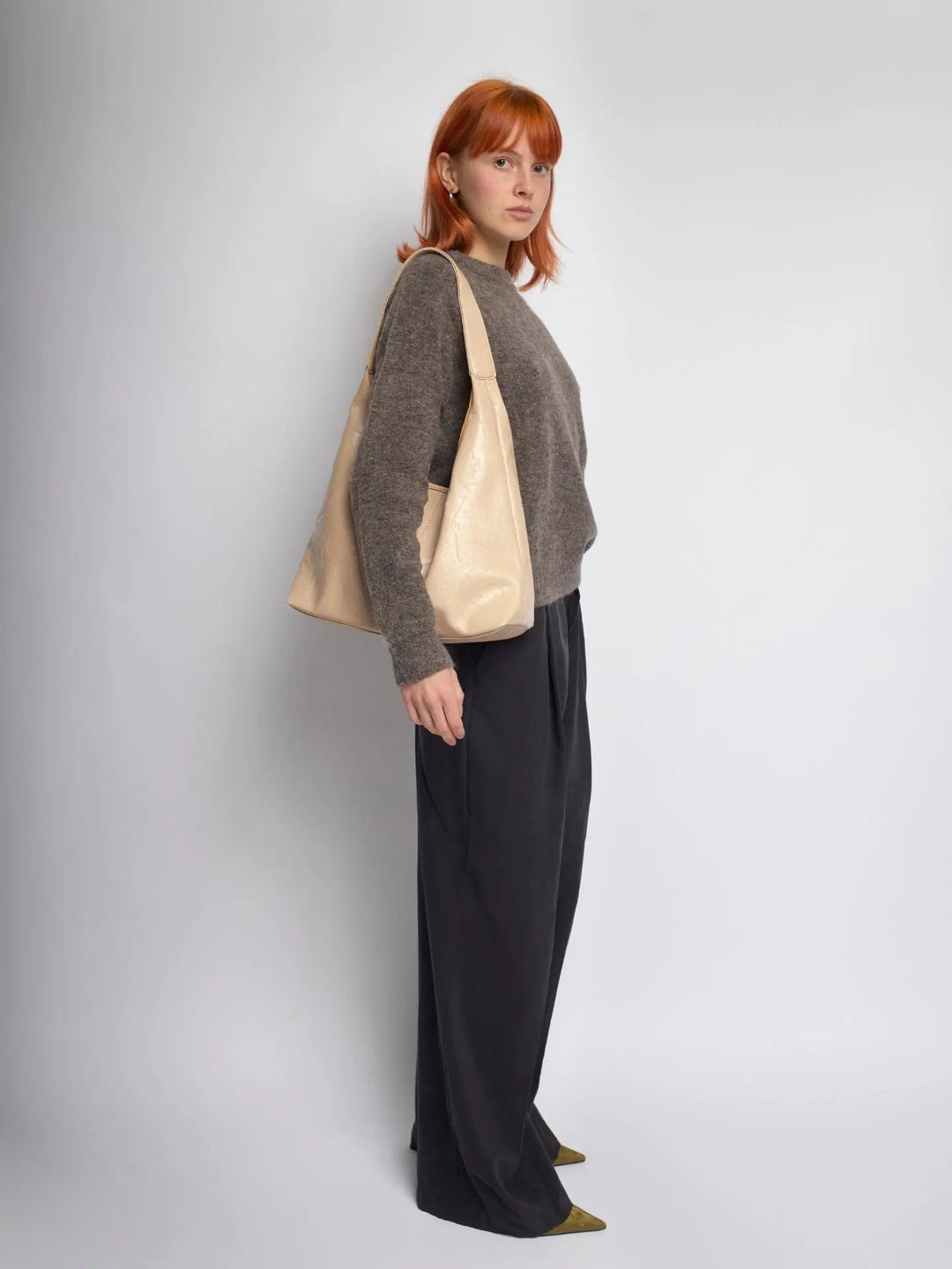 Distressed leather tote, a sophisticated accessory for the modern woman