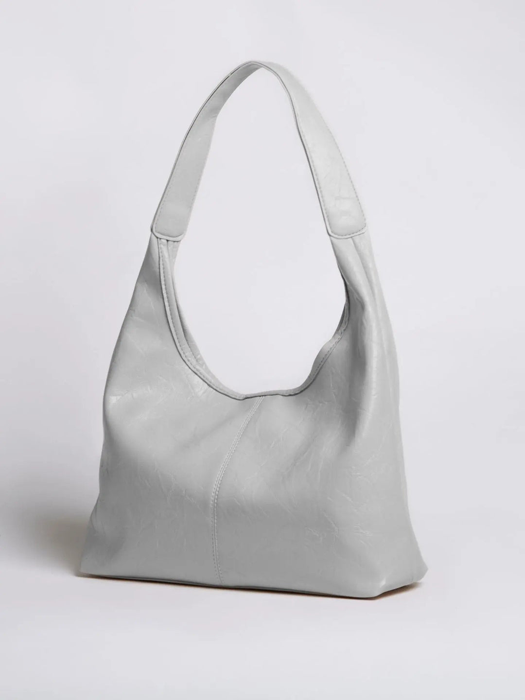 Women's distressed leather tote, a statement accessory for urban adventures