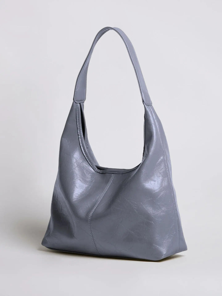 Effortlessly stylish distressed leather tote, a women's everyday companion