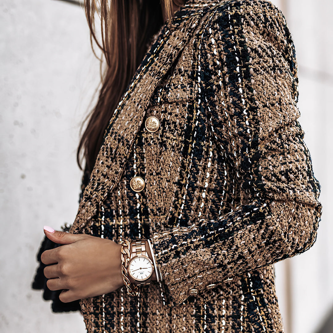 Plaid double breasted women's jacket for a sophisticated look. Checkered outerwear, fashionable.