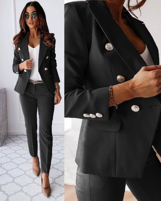 Women's double-breasted tailored suit with slim-fit trousers, ideal for professional business attire.
