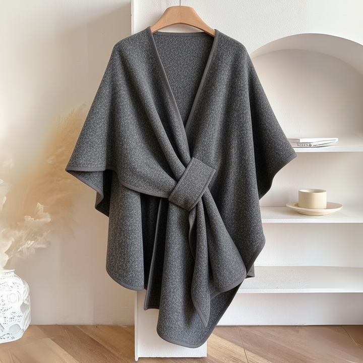 Lightweight drape vest for women, featuring a flattering wrap design and adjustable tie belt.
