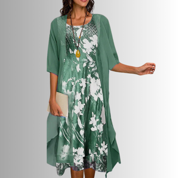 Women's elegant 2-piece summer set with flowy blouse and dress. Chic, comfortable warm-weather outfit.
