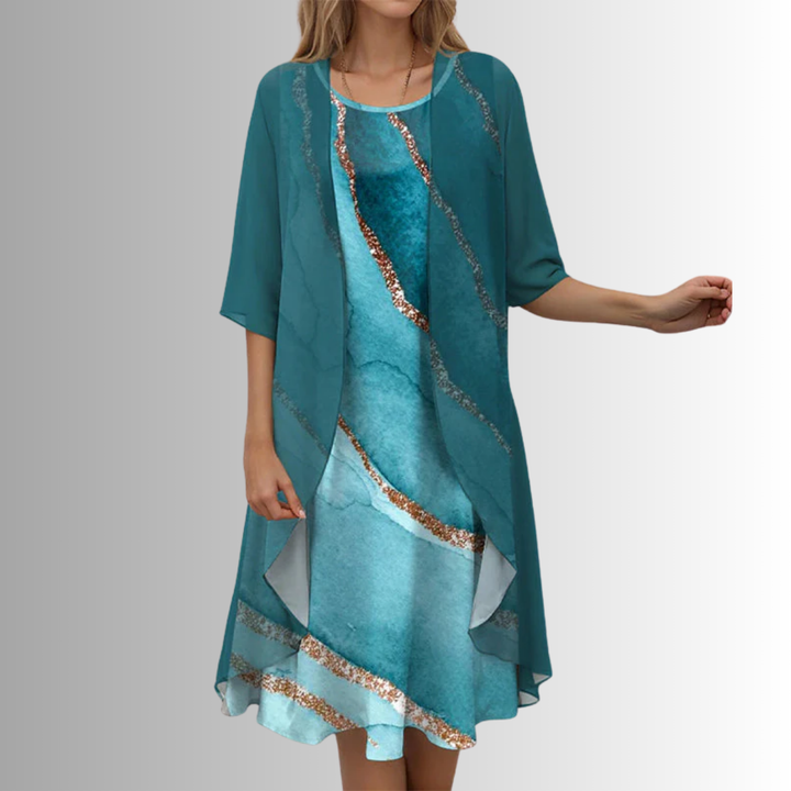 Coordinated women's 2-piece summer outfit. Elegant flowy blouse & matching dress for chic style.