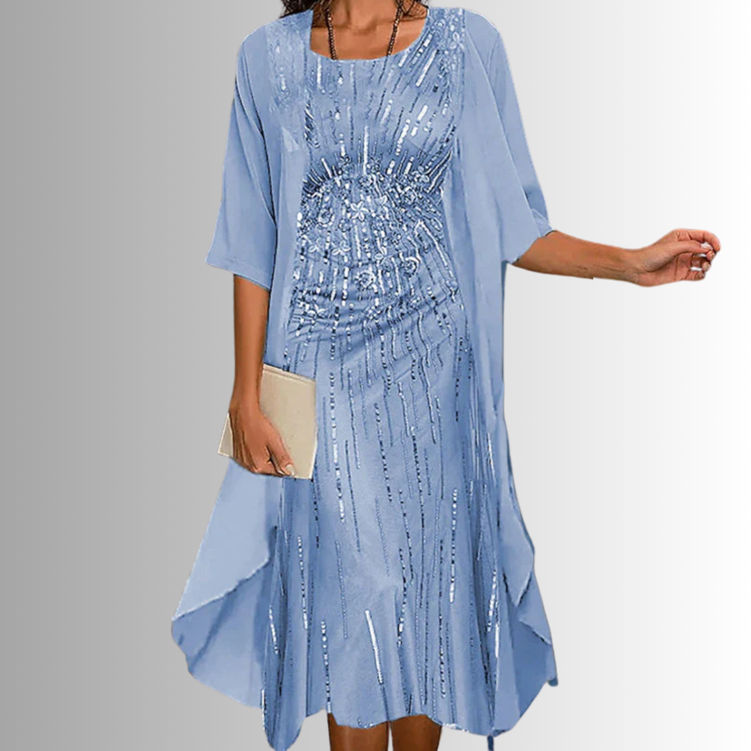 Comfortable women's 2-piece summer set. Flowy blouse & dress, perfect for casual or event wear.