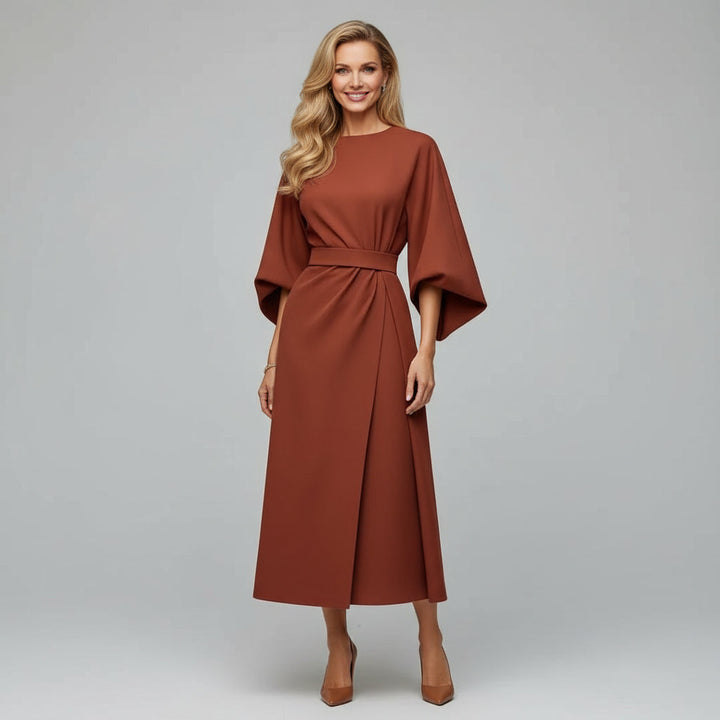 Flowing women's midi dress with an elegant belt and stylish wide sleeves. Perfect for smart casual spring outfits.