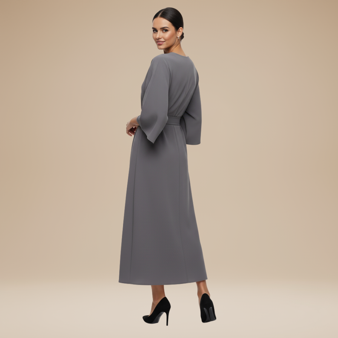 Fashionable women's belted wrap midi dress, flowing wide sleeves, evening appropriate.
