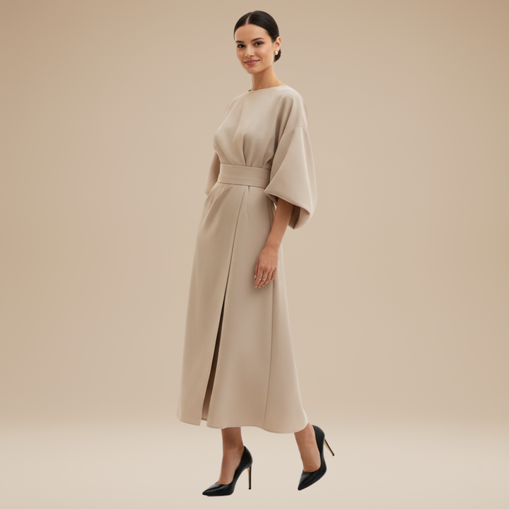 Women's fashion belted wrap midi dress with dramatic wide sleeves, sophisticated.