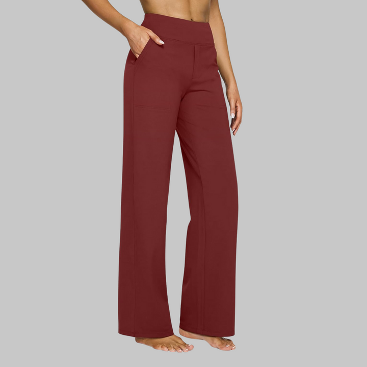 Soft grey women's jersey pants, high-waisted and straight leg, merging comfortwear with elegant style.