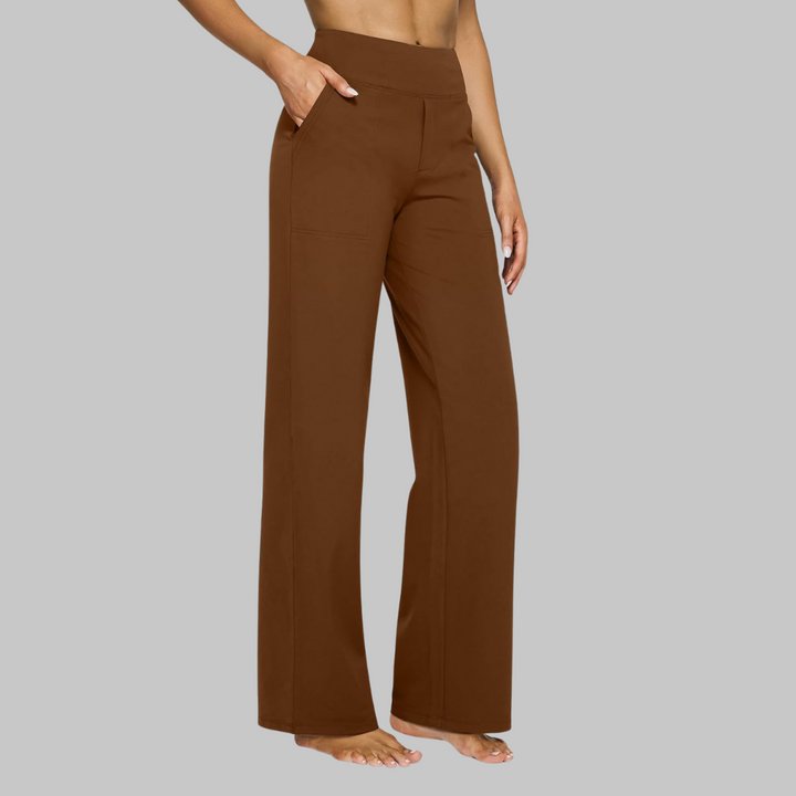 Studio shot of women's comfortable high-waisted jersey trousers, suitable for a sophisticated casual look.