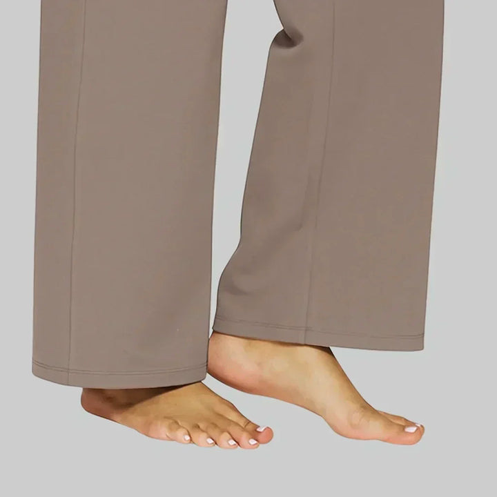 Close-up of the elegant fabric texture of women's jersey straight leg trousers, comfortwear.