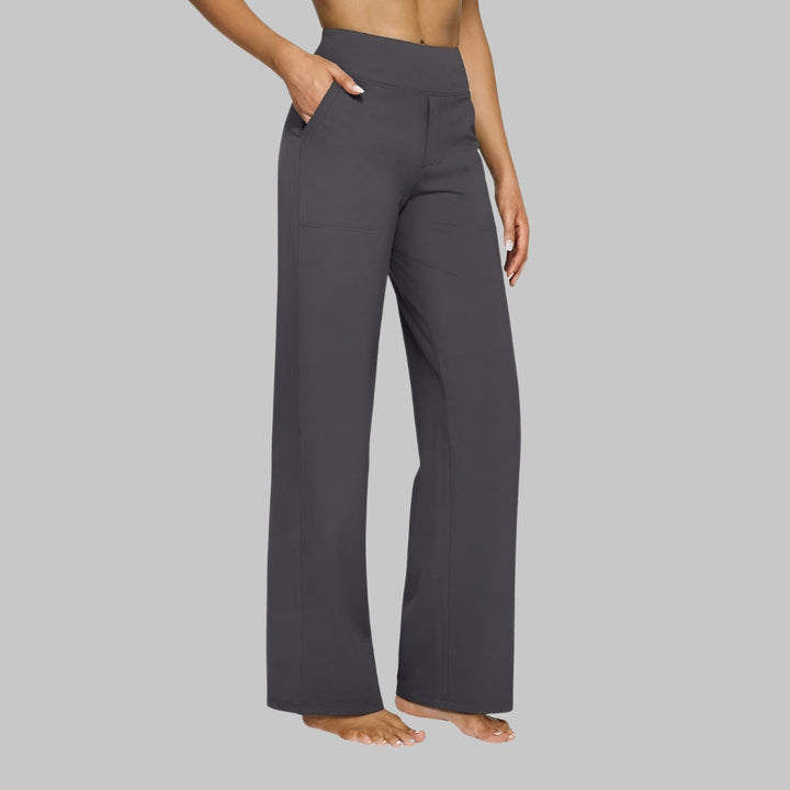 Women's stylish black jersey high-waisted pants, offering an elegant silhouette and elastic waist comfort.