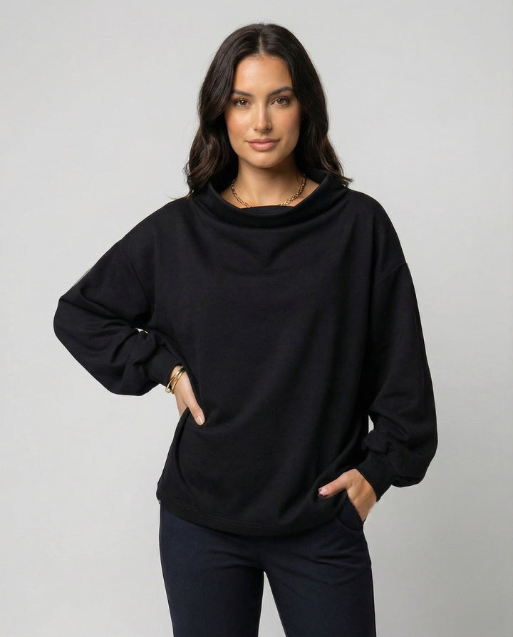 Cozy women's black knit sweater, elegant design with soft texture. Ideal for casual chic fall & winter outfits.