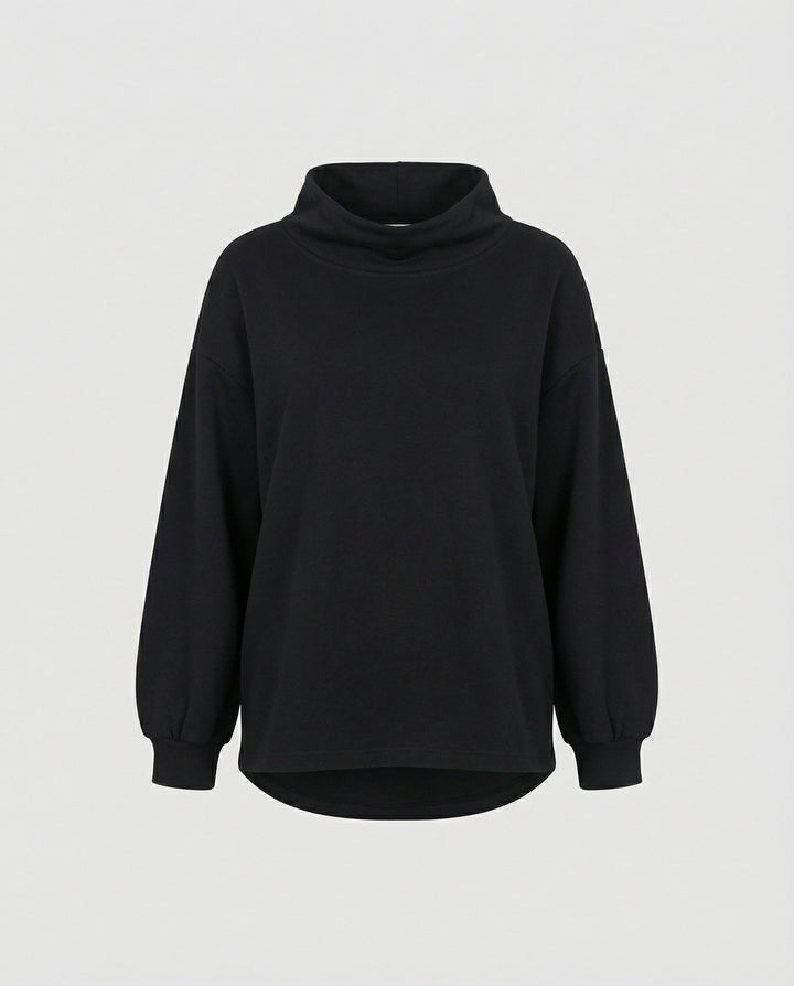 Versatile women's black knit sweater, comfortable & elegant for fall fashion & cozy winter outfits.