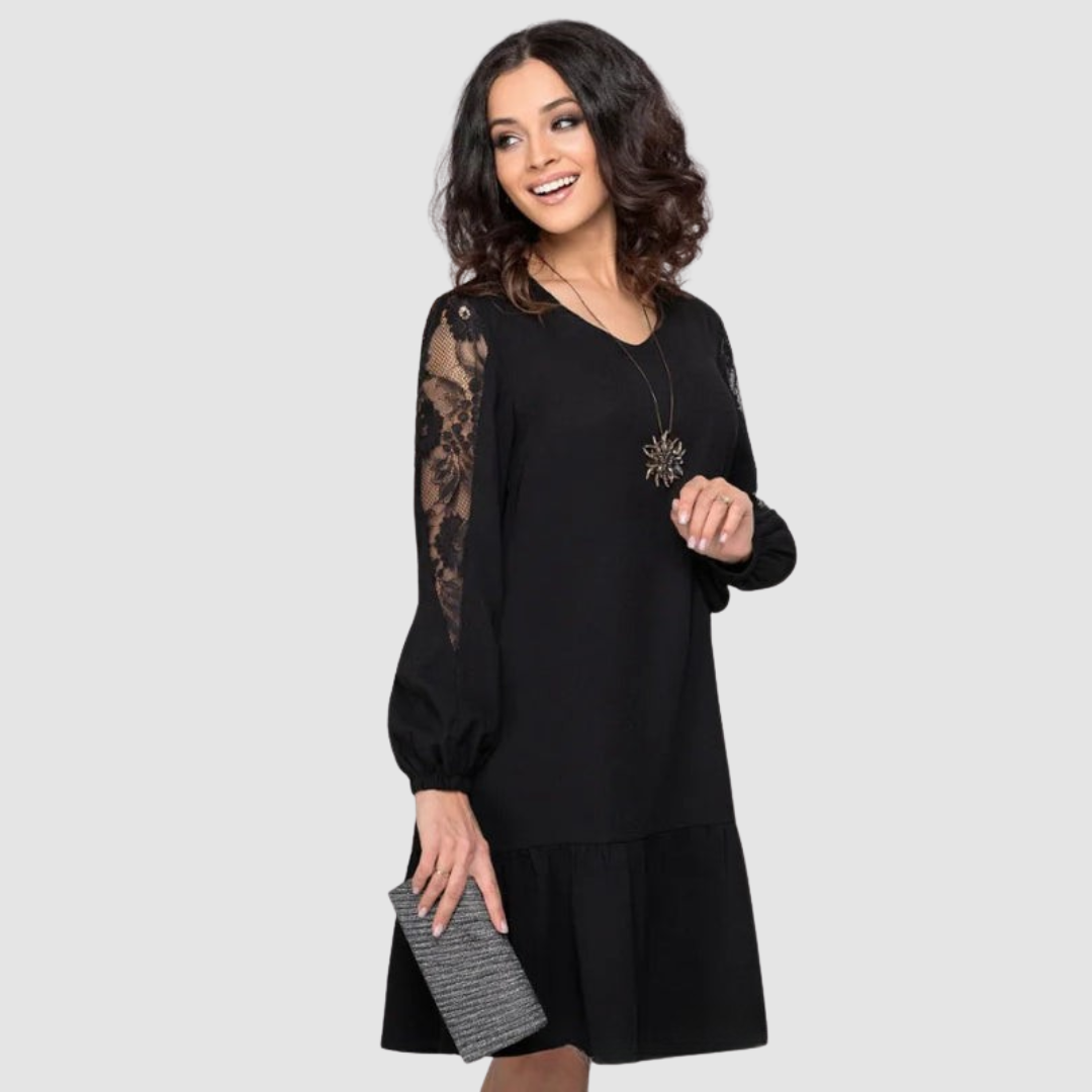 Long sleeve women's midi dress featuring exquisite lace details, a stylish and elegant party outfit.