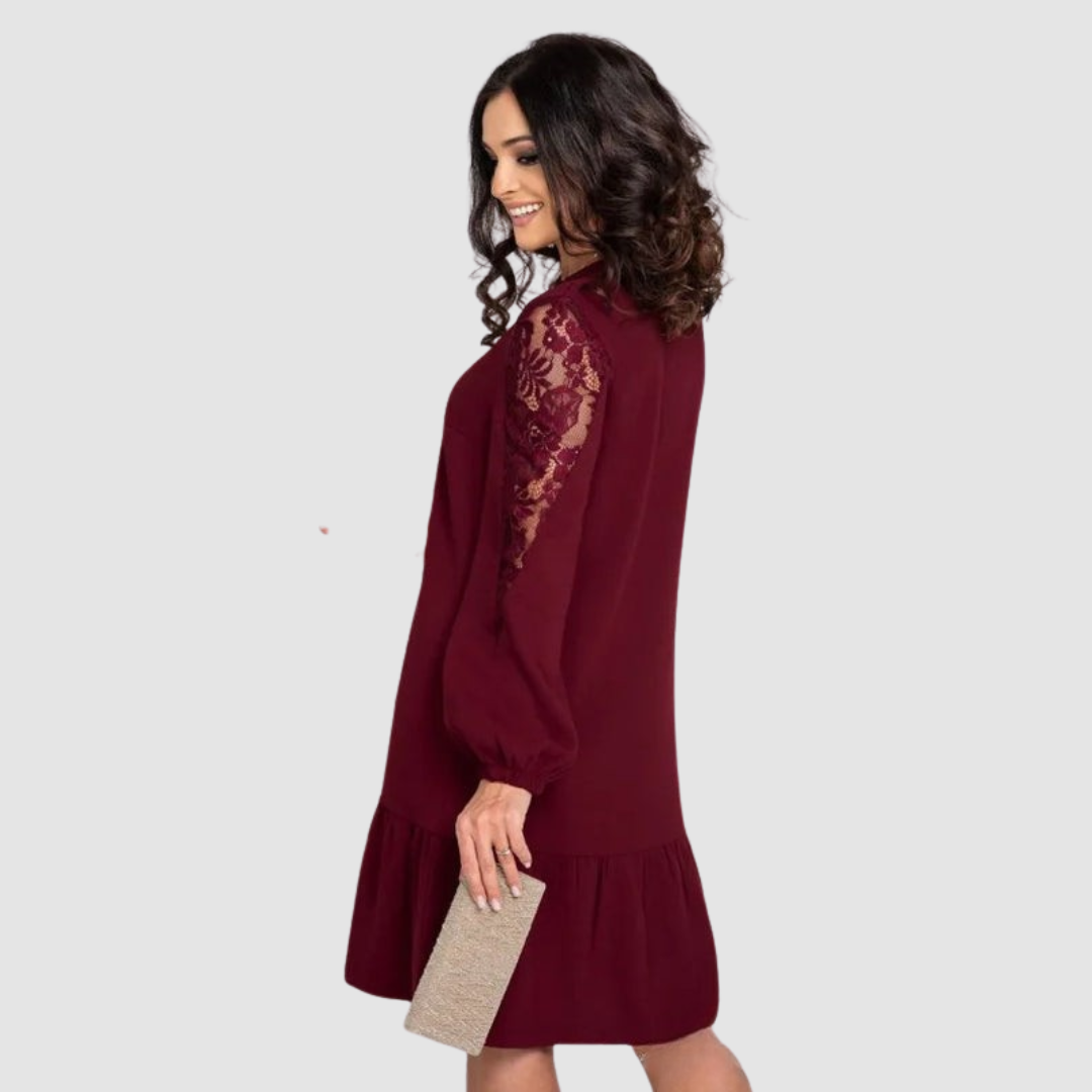 Sophisticated women's midi dress with lace sleeves, a versatile piece for elegant or casual wear in fall.