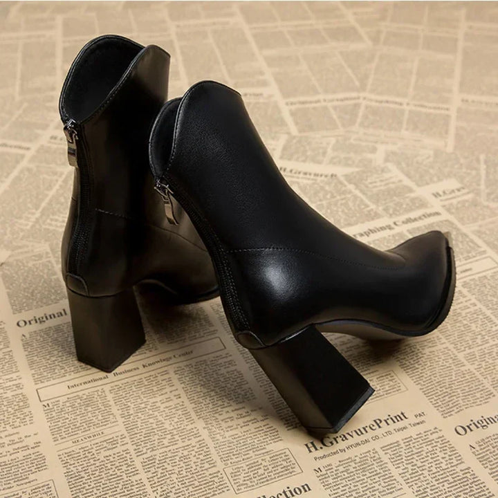 Durable women's spring ankle boots with a refined pointed toe and heel.