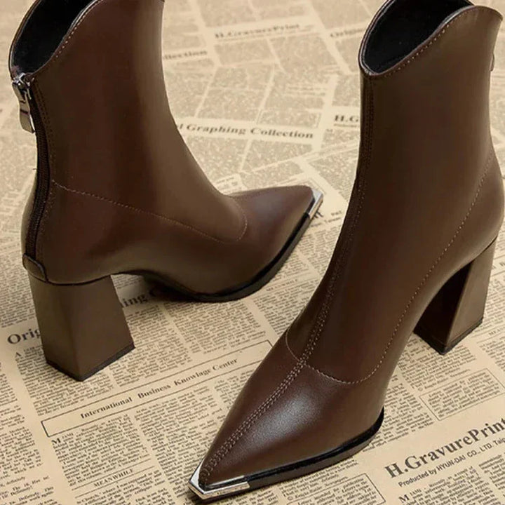 Everyday women's black pointed toe ankle boots, combining comfort and spring fashion.