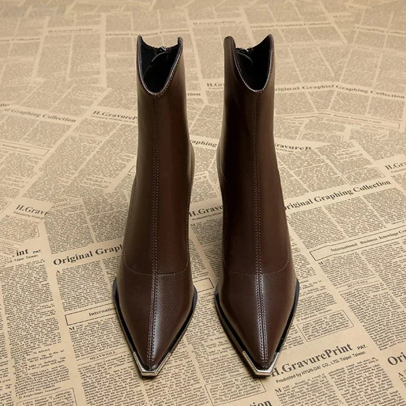 Fashionable women's spring ankle boots, featuring a sharp pointed toe and sturdy heel.