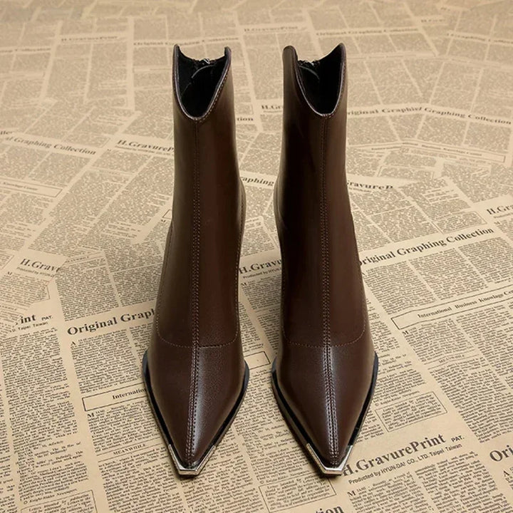 Fashionable women's spring ankle boots, featuring a sharp pointed toe and sturdy heel.