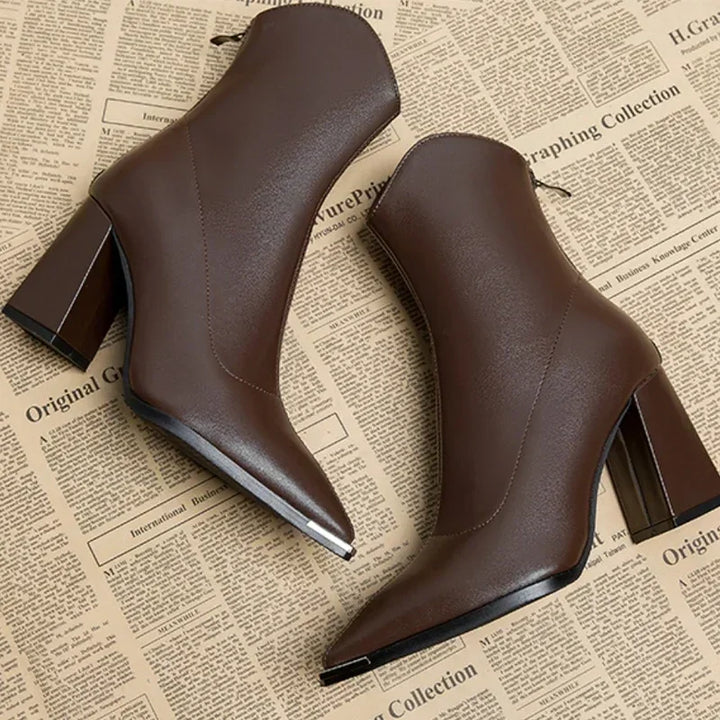 Chic women's spring ankle boots with a pointed toe, an essential elegant footwear.