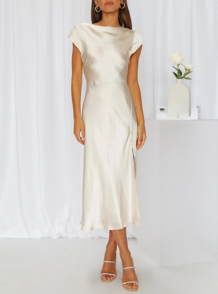 Champagne gold women's slip midi dress, minimalist silhouette, ideal for elegant summer events.