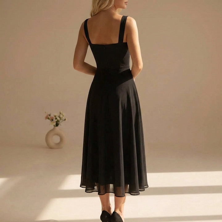Elegant women's square neck midi dress, sleeveless, in a chic summer style, great for parties.