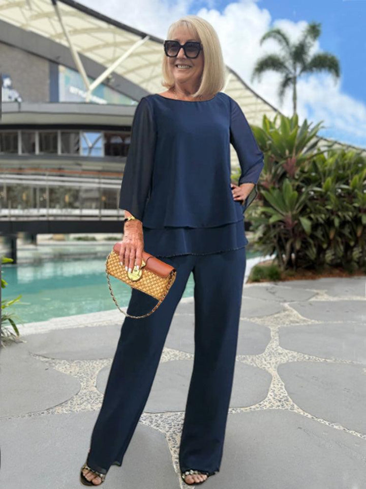 Stylish women's blue matching two-piece pants set, ideal for a chic summer outfit or relaxed loungewear.
