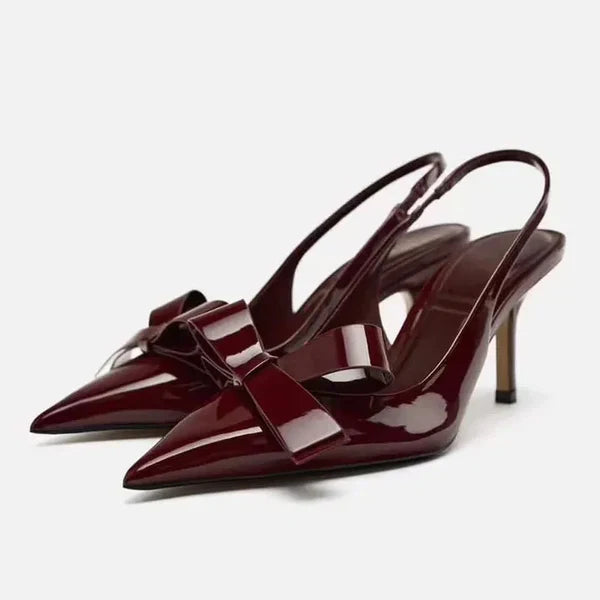 Stylish women's bow slingback pointed toe stiletto heels, ideal for evening wear & formal events.