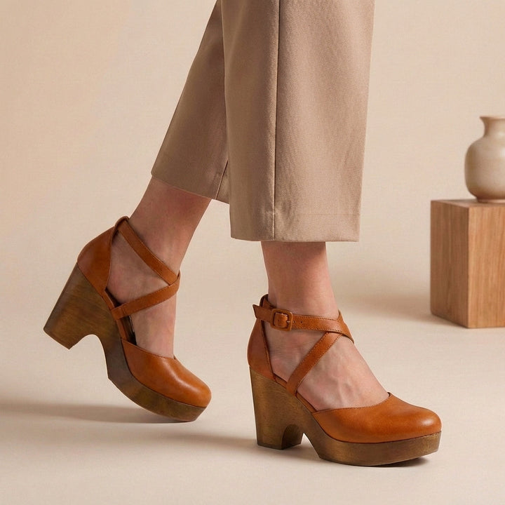 Stylish women's closed-toe platform wedge heels, featuring an ankle strap. Perfect comfortable summer footwear.