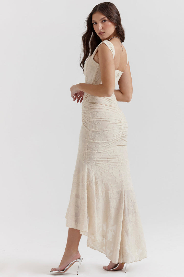 Elegant women's special occasion maxi dress with draped corset and fashionable high-low hem.