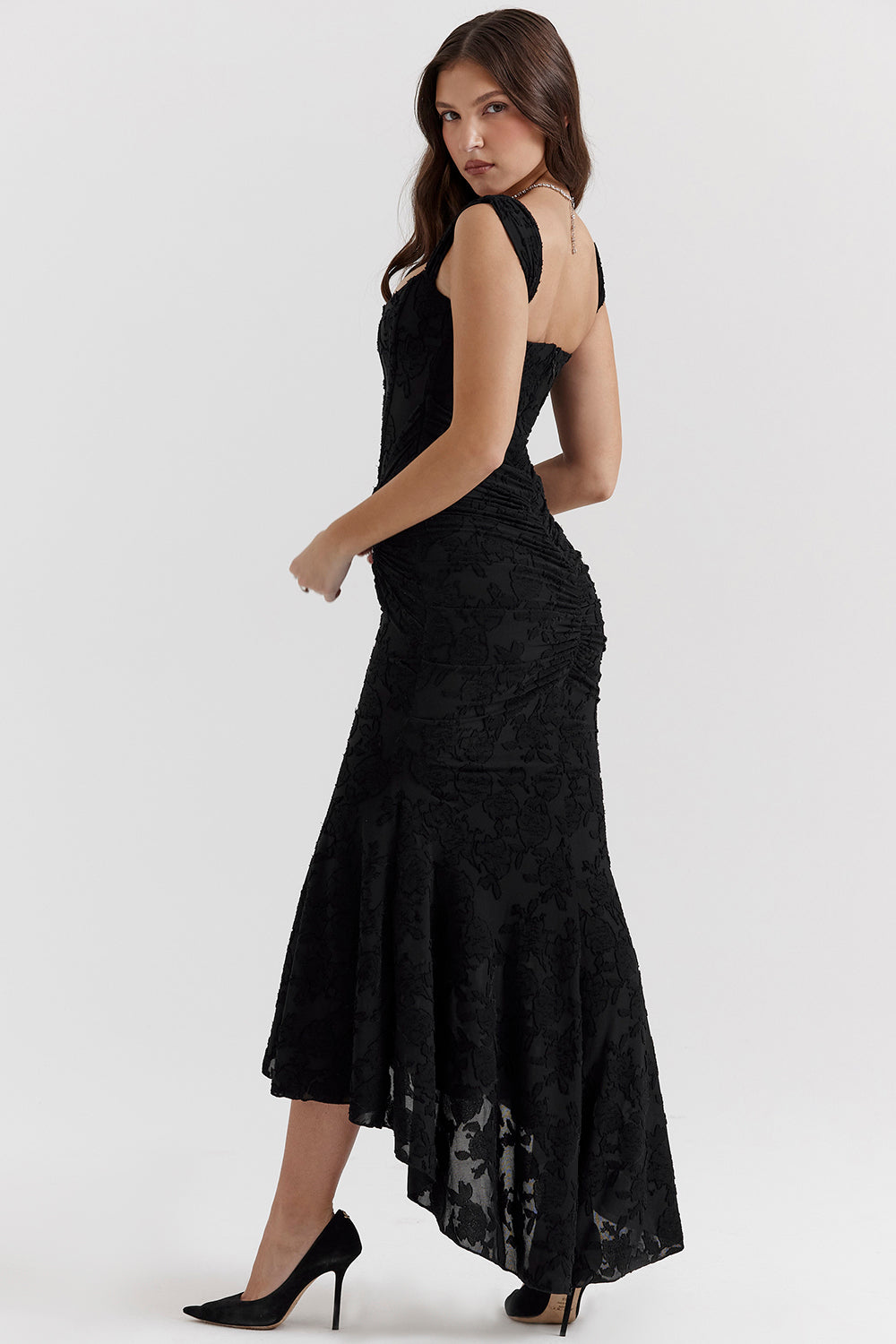 Sophisticated women's formal evening gown with a flattering draped corset and high-low hem.