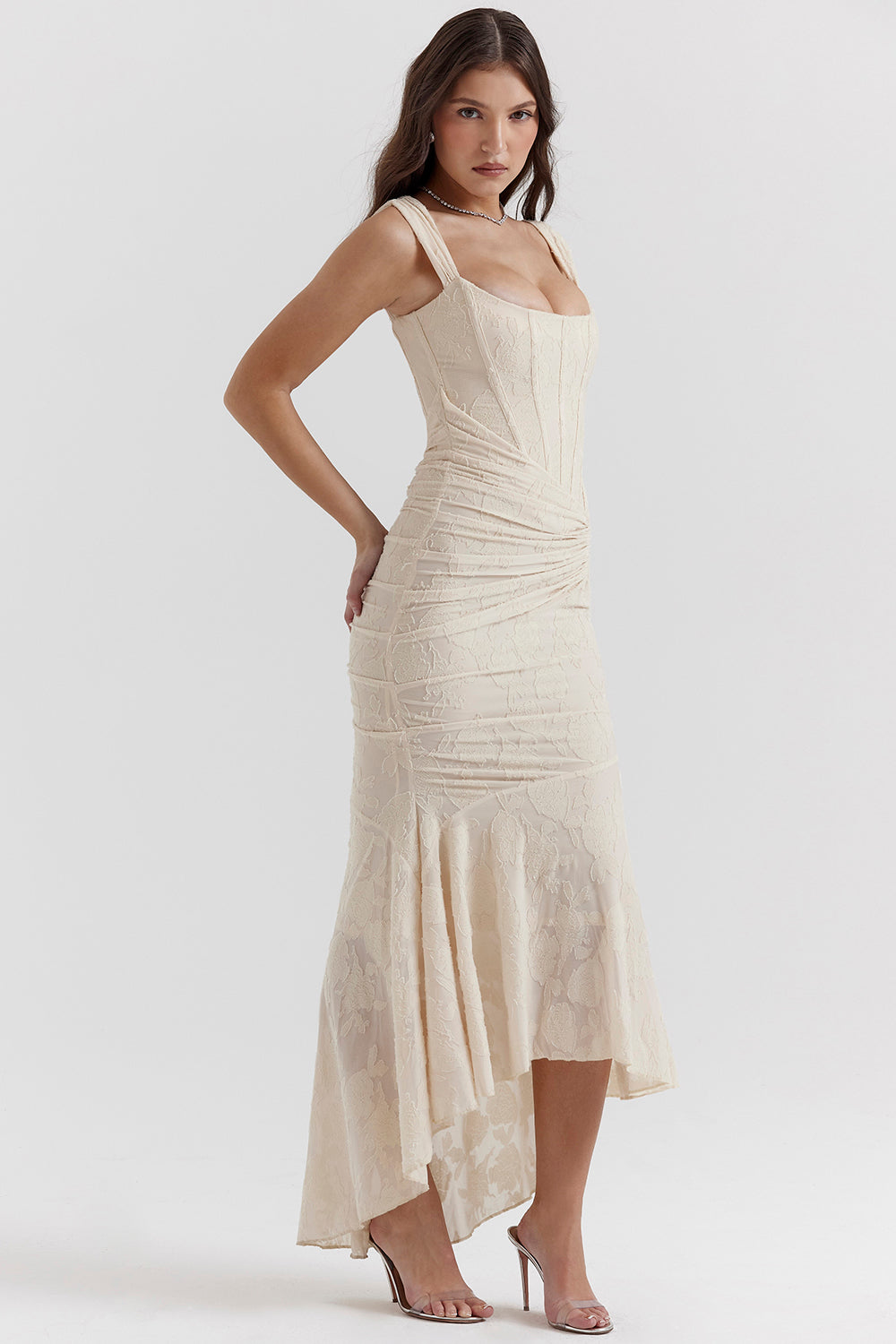 Stylish women's draped formal dress with a corset bodice and unique high-low hem.