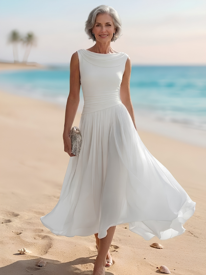 Women's elegant draped neck sleeveless A-line midi dress, perfect for wedding guests or summer parties.