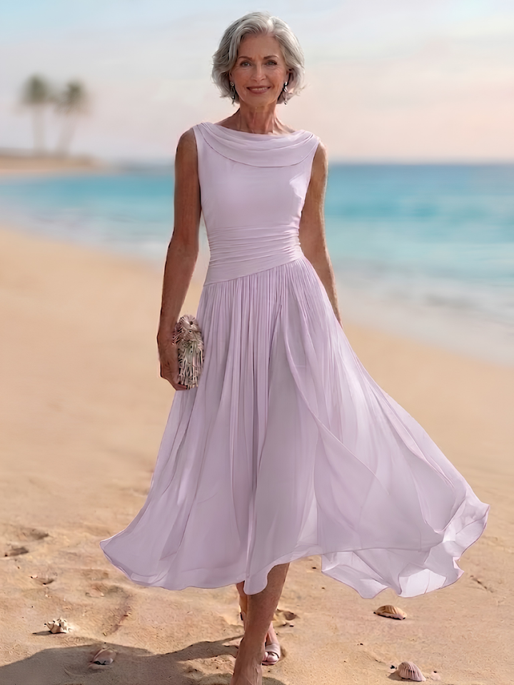 Women's sleeveless draped neck midi dress, featuring a flowy pleated A-line silhouette, suitable for parties.