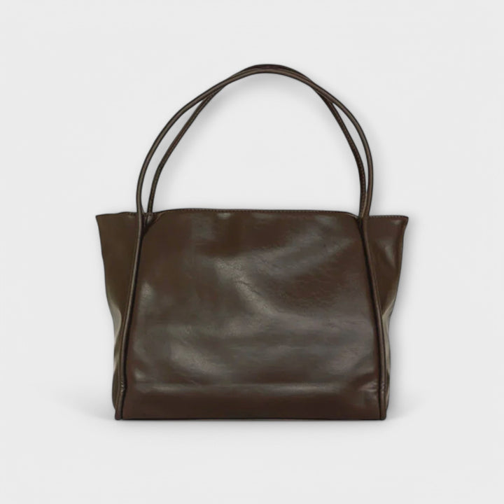 Women's classic shoulder bag in a sophisticated navy, perfect versatile accessory