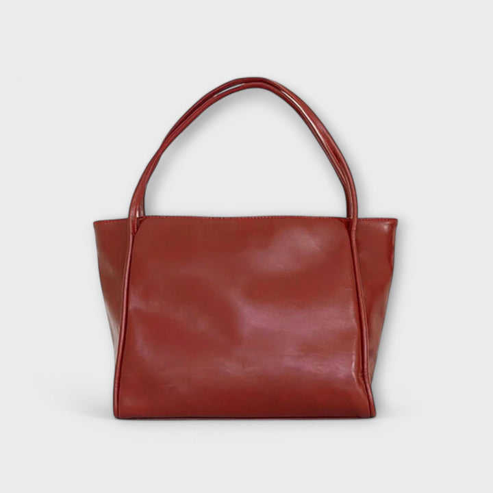 Interior view of a women's tote bag, highlighting its organized compartments