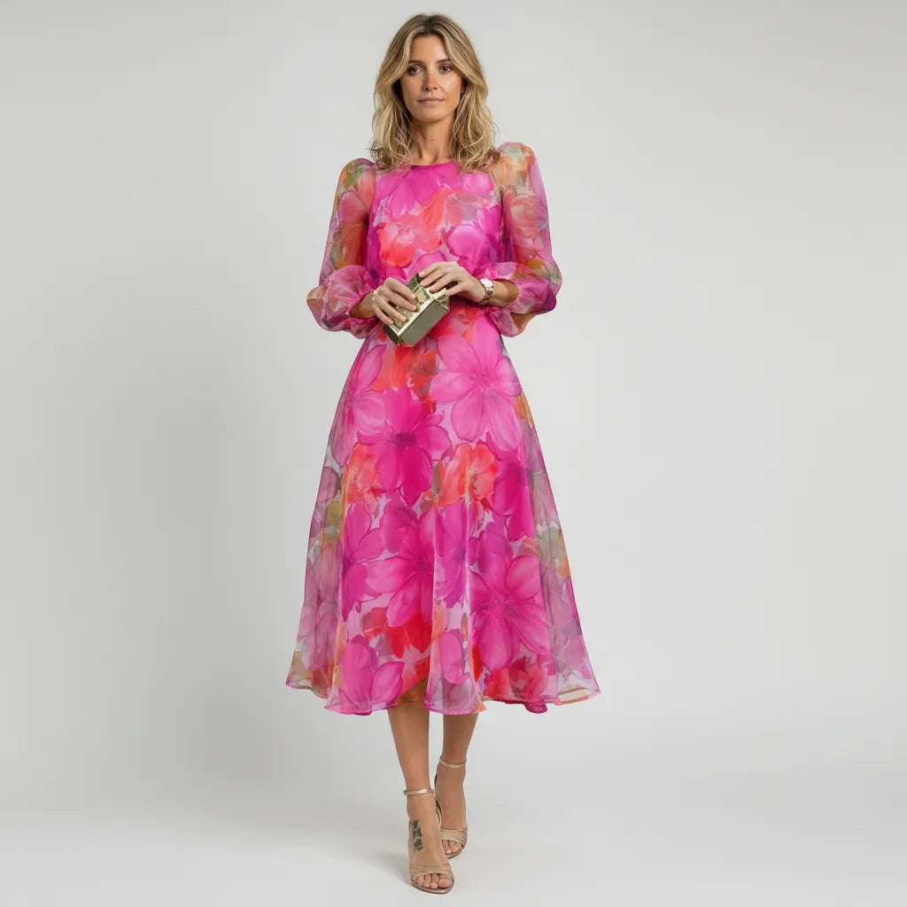 Women's elegant floral puff sleeve sheer midi dress. Perfect summer fashion for parties or special occasions.
