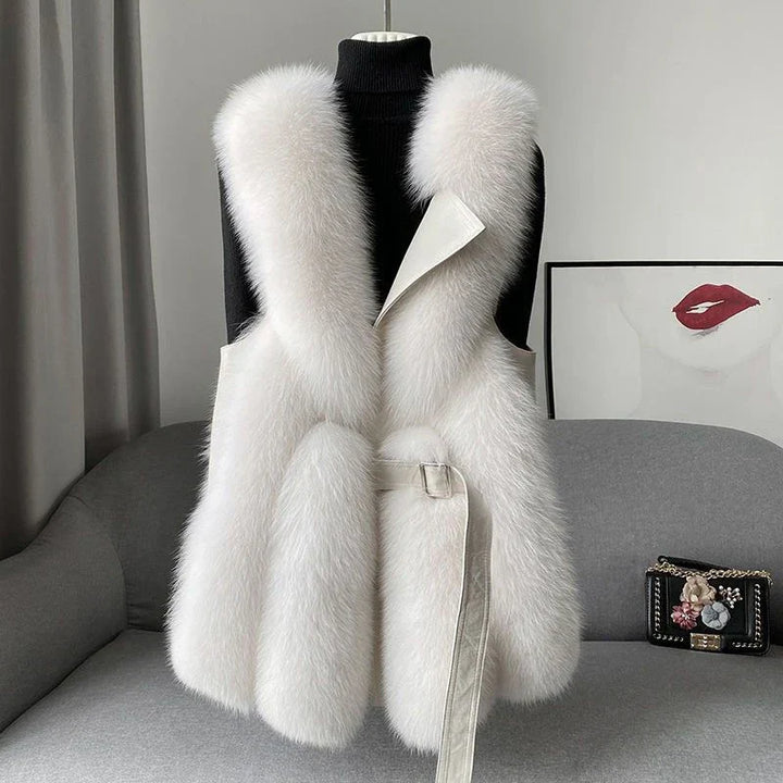 Women's elegant ivory faux fur fluffy vest, perfect for chic layering or winter outerwear fashion.