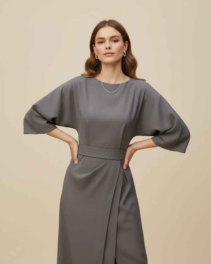 Elegant women's belted midi dress with lantern sleeves, ideal for weddings or parties.