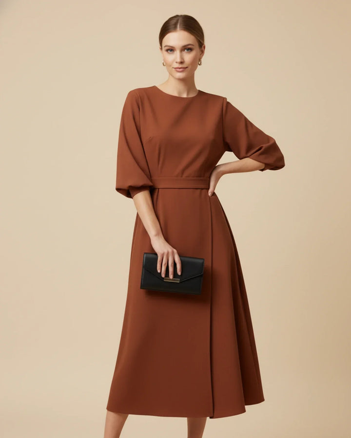 Figure-flattering women's belted wrap midi dress with sophisticated lantern sleeves.