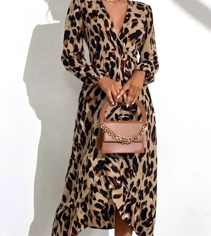 Women's elegant leopard print A-line midi dress with a stylish V-neck. Perfect for casual or occasion wear.
