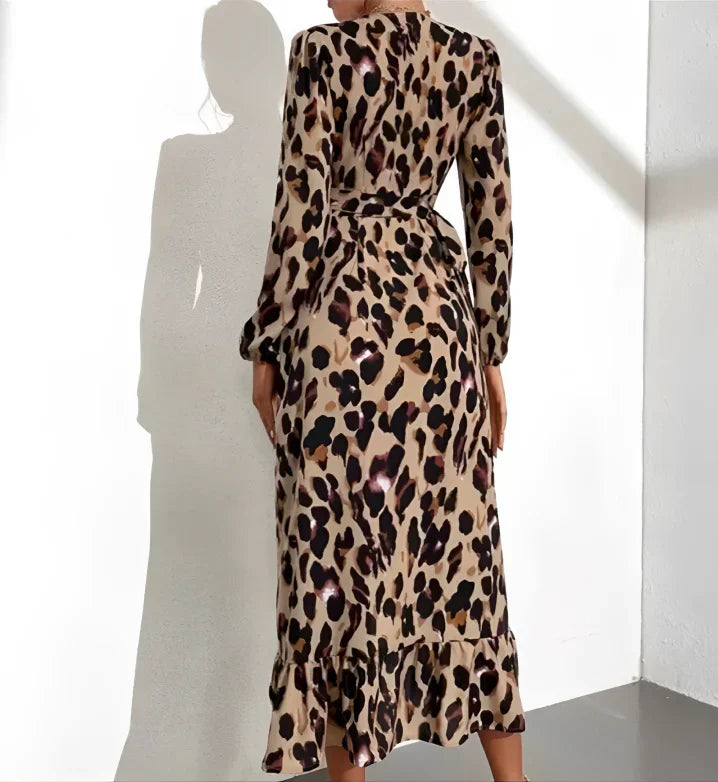 Elegant occasion wear: Women's V-neck midi dress in a chic leopard print, featuring a graceful A-line cut.