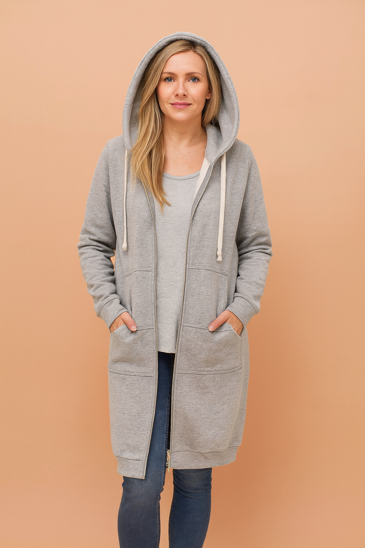 Simple elegant long women's sweater, offering cozy warmth and effortless style.