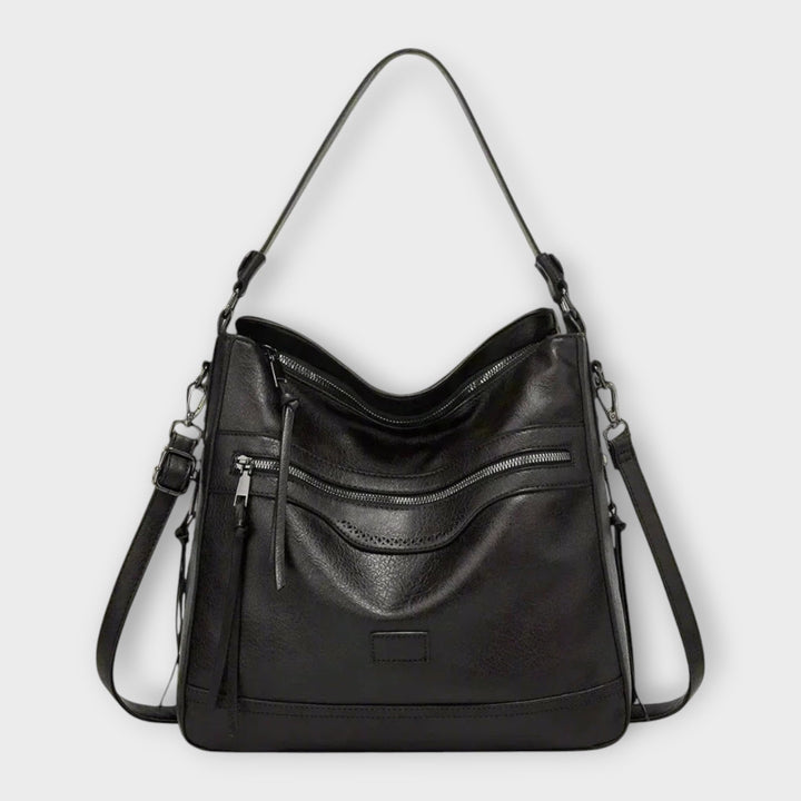 Women's elegant modern shoulder bag in faux leather, a chic fashion accessory for daily use.
