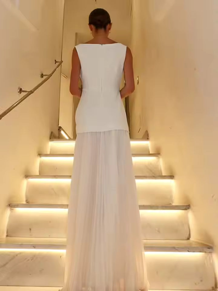 Chic women's sleeveless pleated midi dress, elegant, flowy design, ideal for formal and party wear