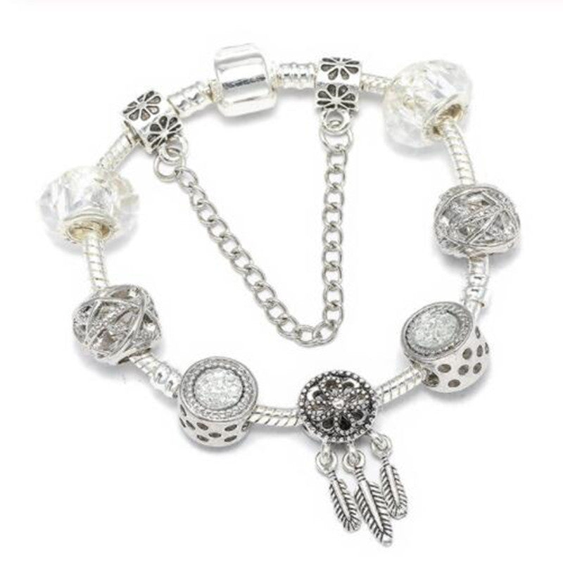 Women's elegant peach blossom charm bracelet for daily wear. Dainty fashion jewelry with blossom motif.