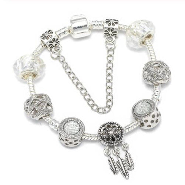 Women's elegant peach blossom charm bracelet for daily wear. Dainty fashion jewelry with blossom motif.
