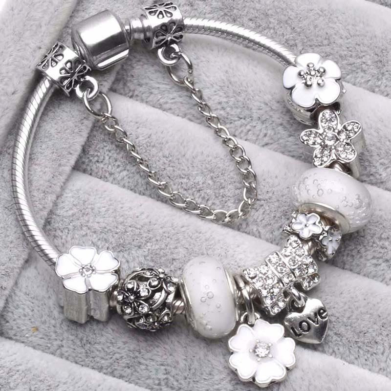Women's dainty peach blossom charm bracelet. Elegant & versatile fashion jewelry, comfortable for daily wear.