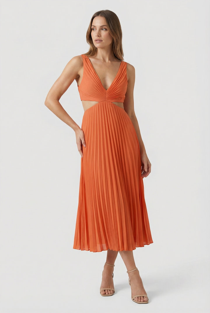 Women's elegant pleated maxi dress with a unique cut-out detail, perfect for events.